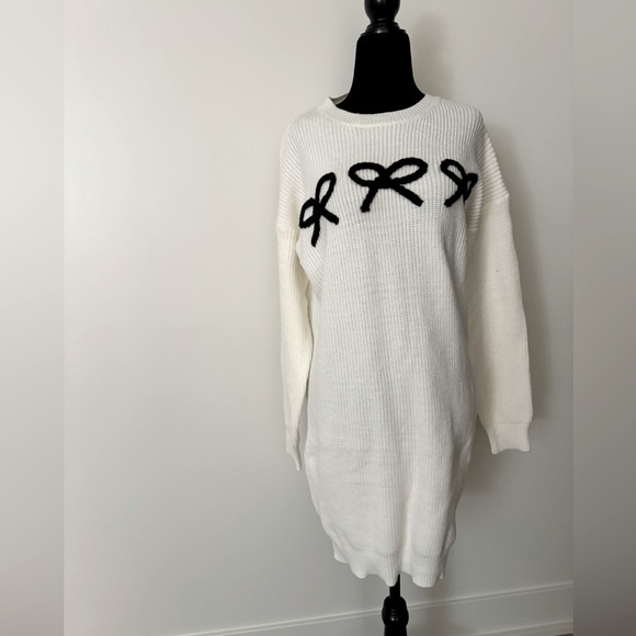 Dreamers by debut knit sweater dress with black bow detail. Size medium. - Picture 1 of 5